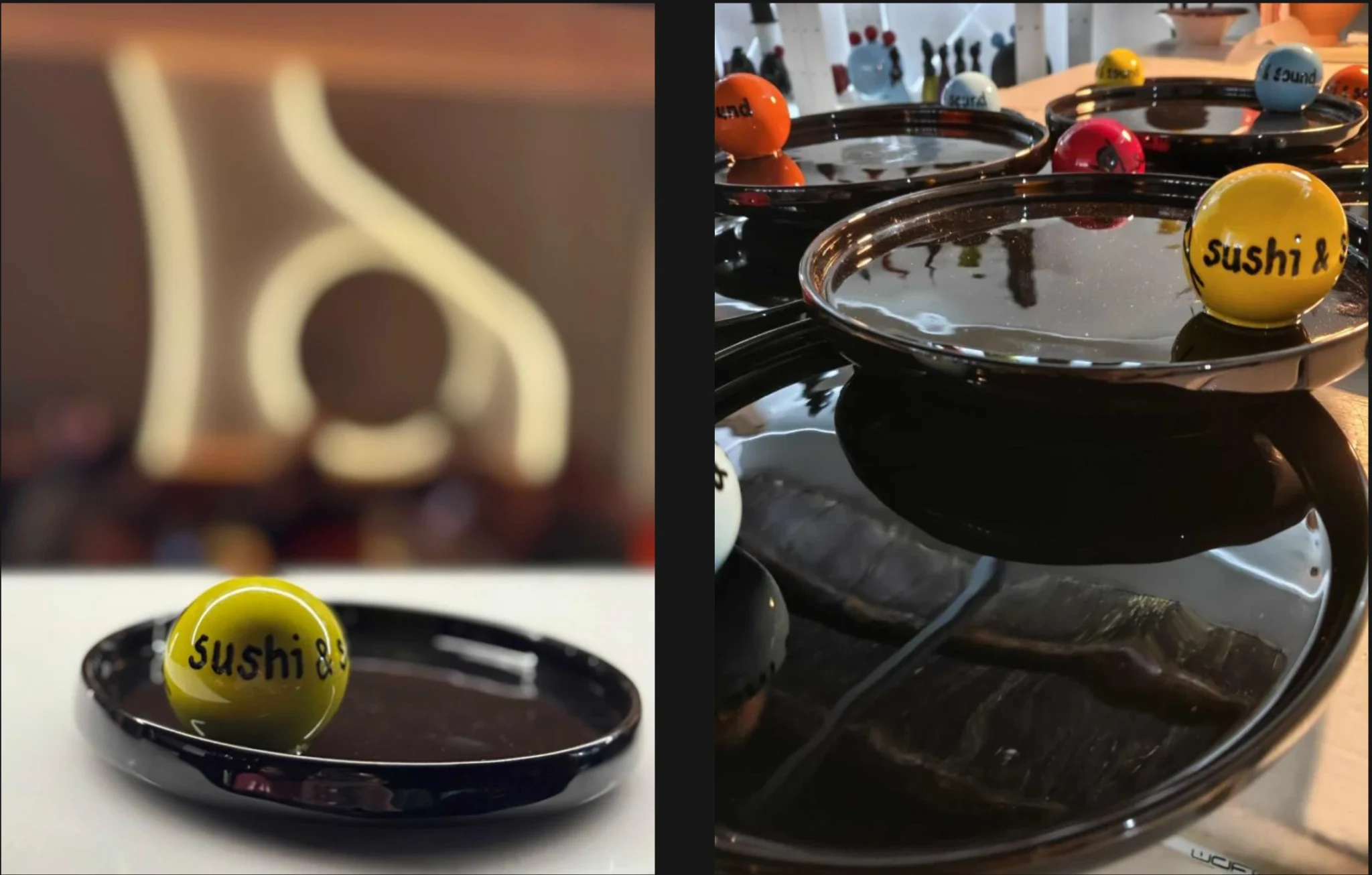 Yellow sushi ball on a small black dish, with 'sushi &' text visible, foreground shot in a restaurant setting; multiple trays in background.